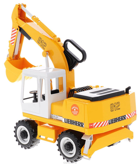 Camion-benne BRUDER MAN TGA et pelle Liebherr, 02751