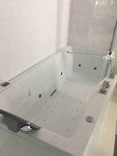 Baignoire à porte NOVELLINI IRIS version COMBY avec pare-baignoire