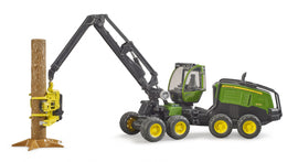 Harwester John Deere 1270G z konarem drzewa