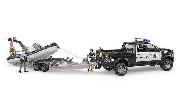 BRUDER RAM 2500 Police Pickup with L+S Module, trailer and boat, 02507