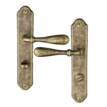 2 poignées de porte sur plaque CARINA, Verrou de condamnation pour salle de bain/WC, Finition laiton antique, Entraxe standard 195 mm