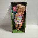 Ecost Customer Return Nenuco and Her Tricycle Baby Doll with Cute Dress, Pink Tricycle with Basket,