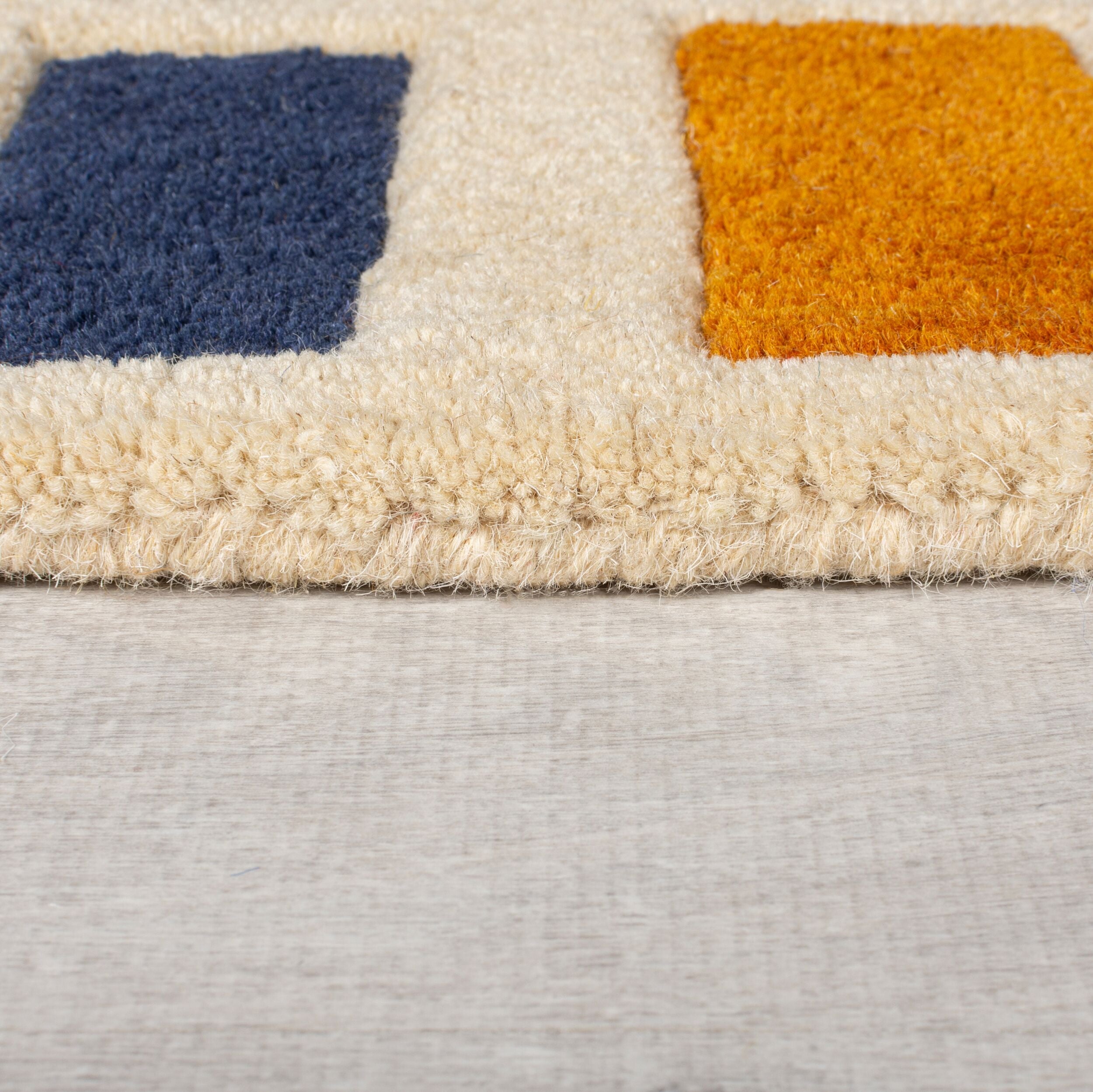 Tapis moderne en laine tufté main picto