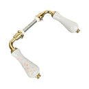 2 poignées de porte ROSAE, Sans trou pour pièce à vivre, Porcelaine de Limoges, Finition coude doré, Entraxe standard 195 mm
