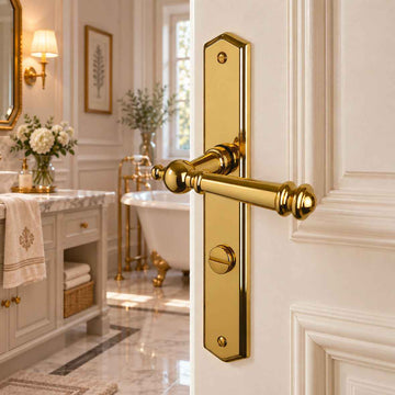 2 poignées de porte ATTILA, Verrou de condamnation pour salles de bain/WC, Finition laiton poli doré, Entraxe standard 195 mm