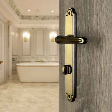 2 poignées de porte sur plaque VANESSA, Verrou de condamnation pour salle de bain/WC, Finition laiton patiné, Entraxe standard 195 mm