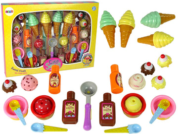 Coffret de gourmandises glaces cupcakes sauces cuillères