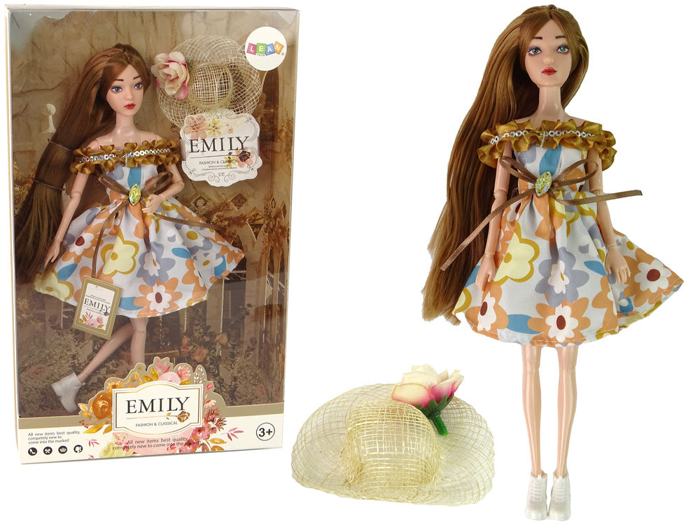 Poupée bébé emily chapeau aux cheveux roux d'automne