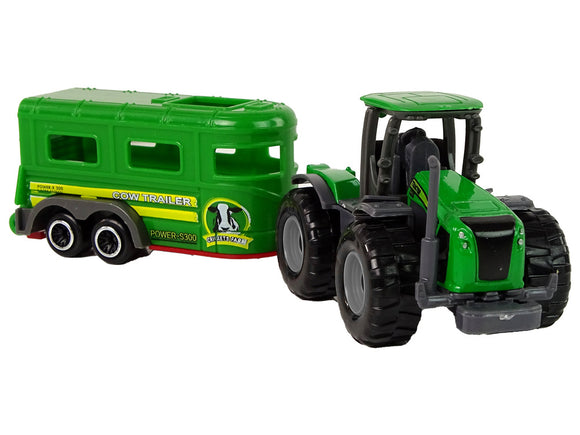 Tracteur avec remorque vert