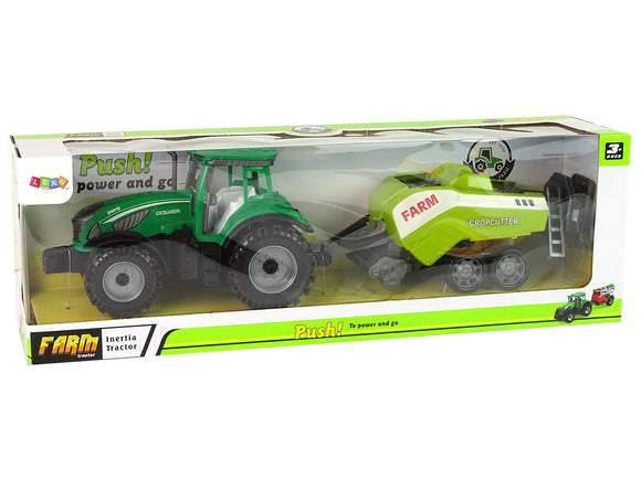 Tracteur agricole vert semoir entraînement par friction