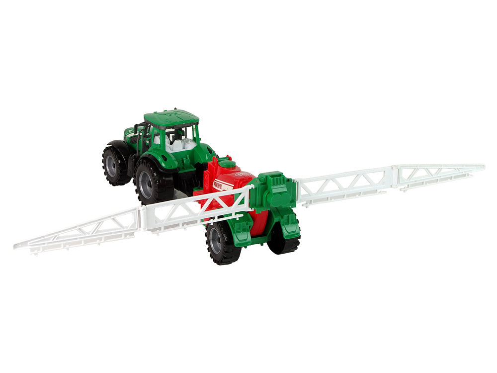 Tracteur agricole vert avec pulvérisateur rouge et vert à entraînement fricatif