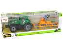 Tracteur vert avec entraînement par friction orange et bleu