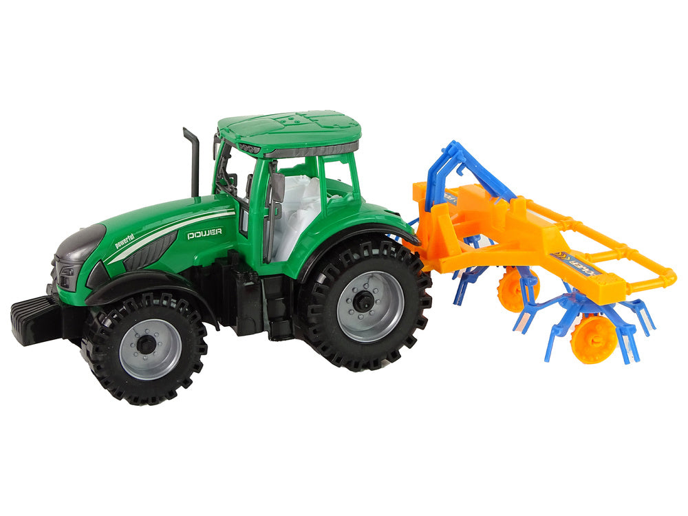 Tracteur vert avec entraînement par friction orange et bleu