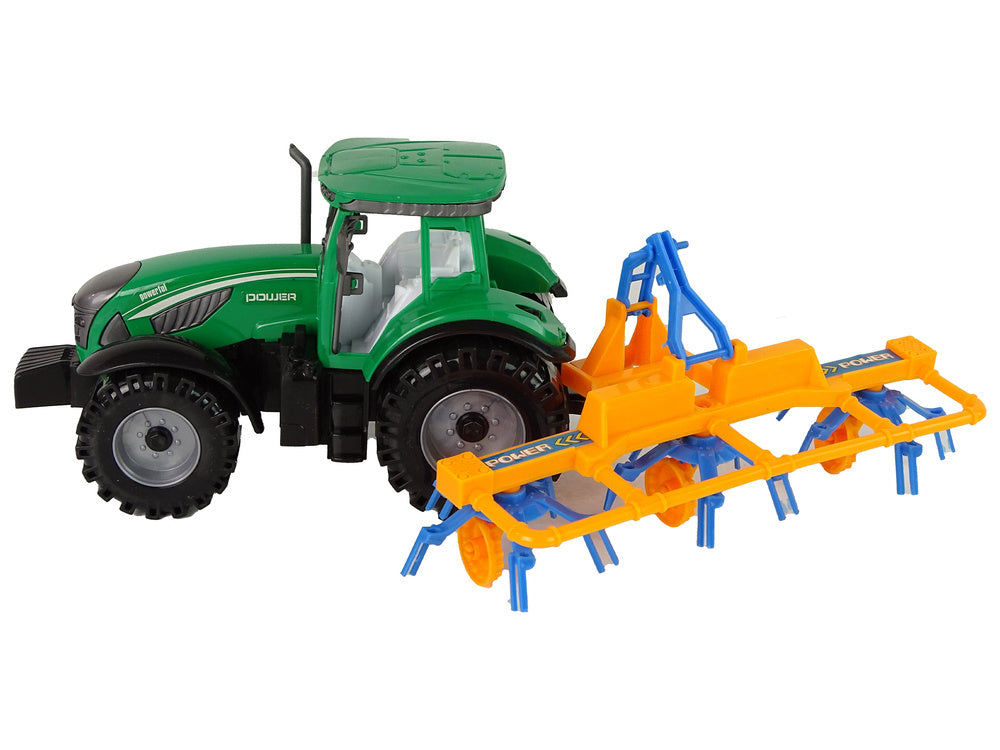 Tracteur vert avec entraînement par friction orange et bleu