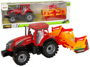Tracteur rouge avec entraînement de cultivateur orange