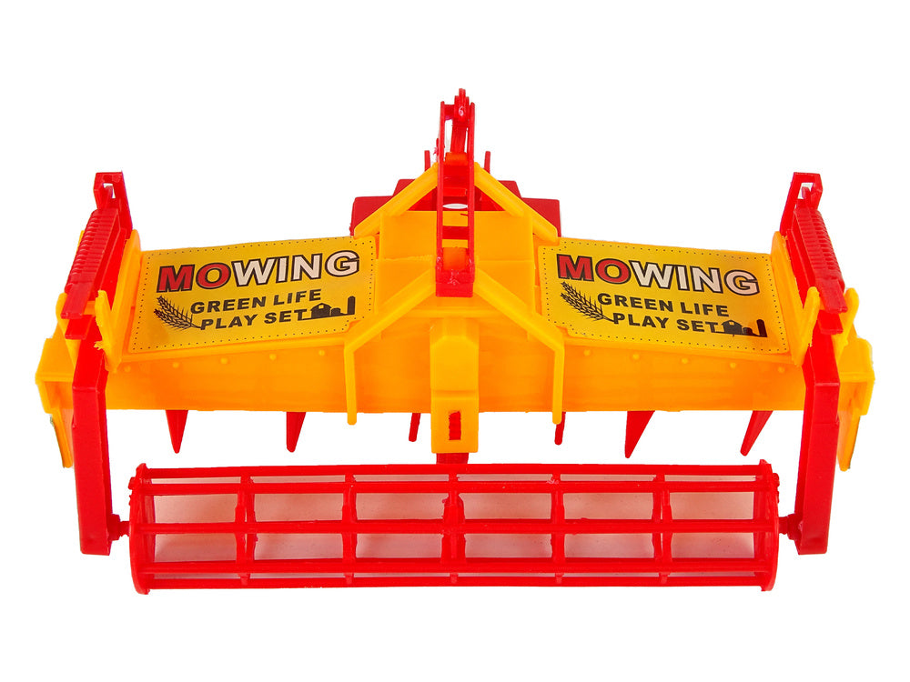 Tracteur rouge avec entraînement de cultivateur orange