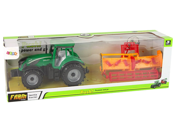 Tracteur vert avec cultivateur orange pour enfants