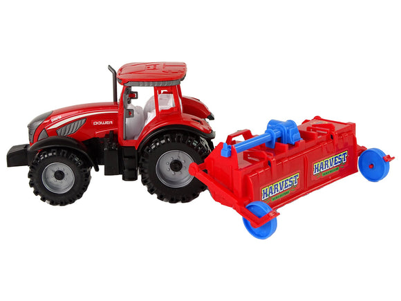 Tracteur rouge avec entraînement par friction de la charrue