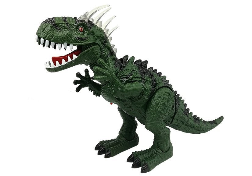 Un dinosaure vert à piles se déplace avec le projecteur sonore
