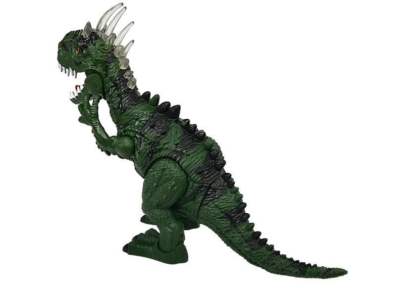 Un dinosaure vert à piles se déplace avec le projecteur sonore
