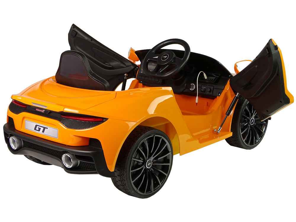 Véhicule électrique McLaren GT 12 V peint en orange
