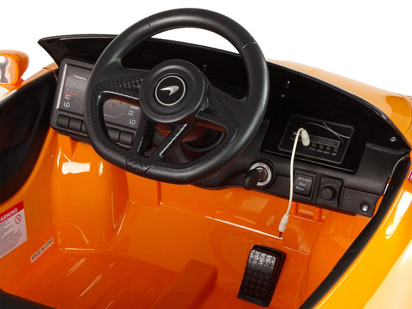 Véhicule électrique McLaren GT 12 V peint en orange