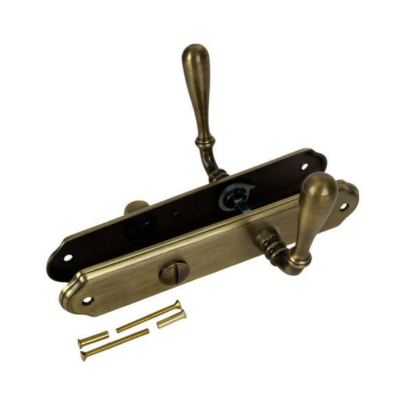 2 poignées de porte sur plaque CARINA, Verrou de condamnation pour salle de bain/WC, Finition laiton patiné, Entraxe standard 195 mm