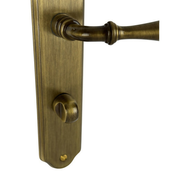 2 poignées de porte sur plaque CARINA, Verrou de condamnation pour salle de bain/WC, Finition laiton patiné, Entraxe standard 195 mm